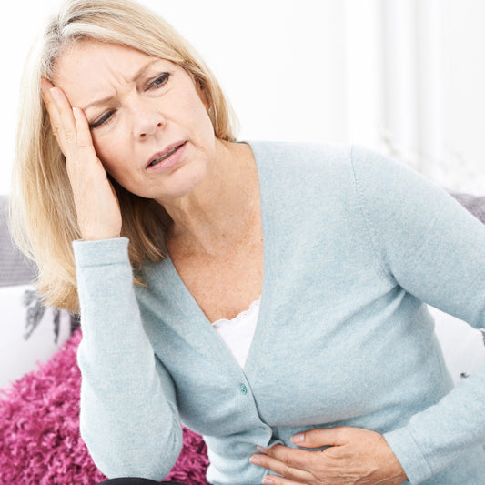 Medical illustration showing how chronic stress impacts gut health through the brain–gut axis, affecting digestion, inflammation, and microbiome balance.