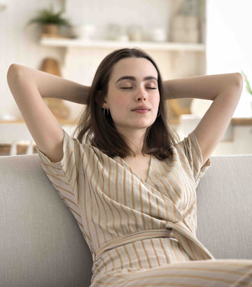 Woman relaxing with StressControl by Answers Wellness—natural stress supplement for calmWoman relaxing with StressControl by Answers Wellness—natural stress supplement for calm